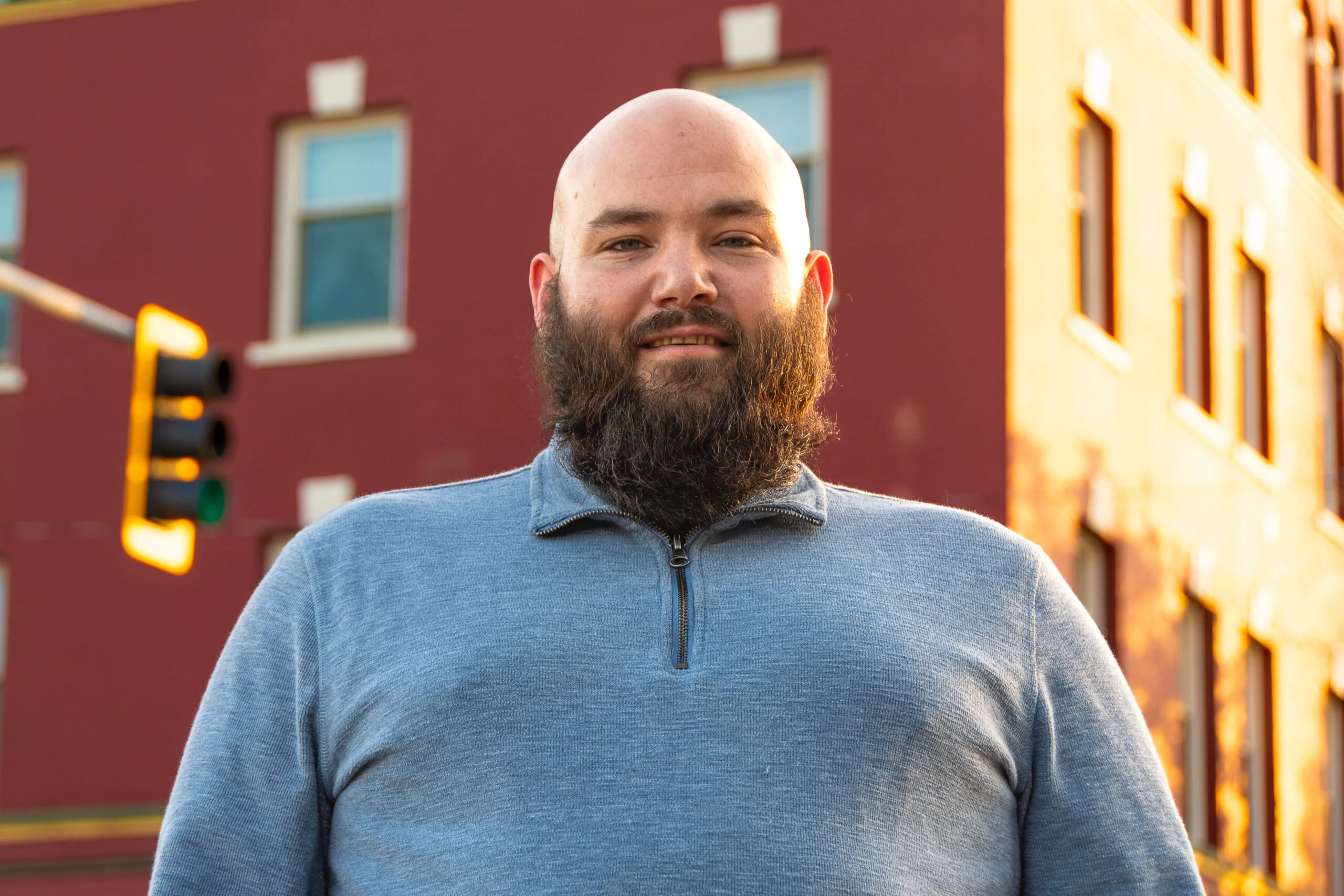 Portrait of Keith Jackson in front of the Lorenz Hotel in downtown Redding.